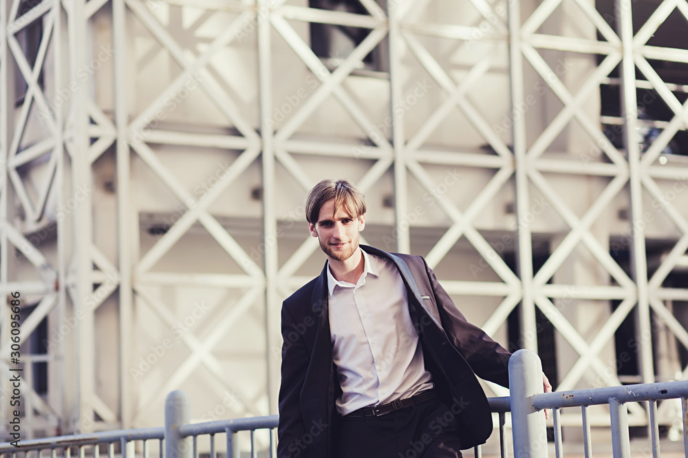 young successful businessman in urban environment young successful businessman in urban environment