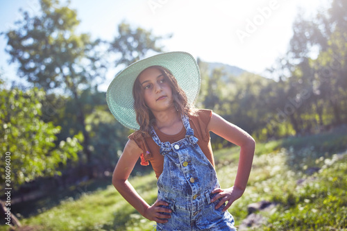 Cute ten year old girl posing in nature.