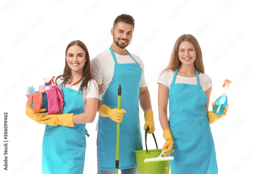 Team of janitors with cleaning supplies on white background Team of janitors with cleaning supplies on white background