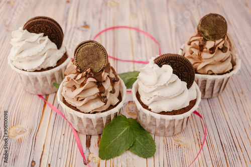 Cupcakes with cookies whipped cream