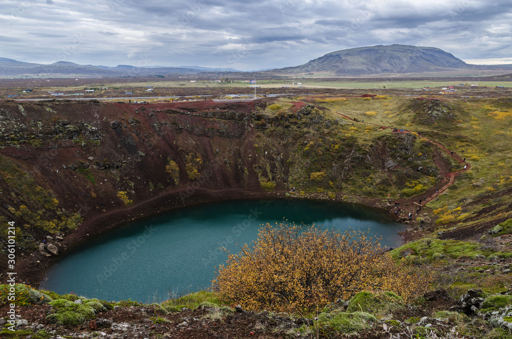 Kerid Crater Lake, formed from an inactive volcano, can be found off the Golden Circle Iceland