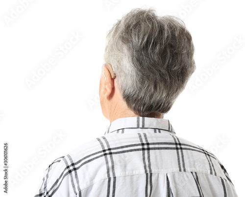 Senior woman with hearing a...