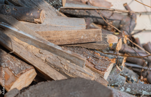 Stock of firewood for winter, wood closeup
