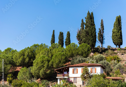 Village house. Historic Izmir Birgi village. Houses combined with trees.
