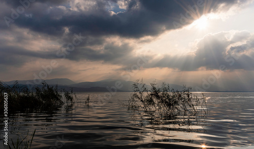 Sunlight leaking through sunset and clouds on Lake Sapanca.