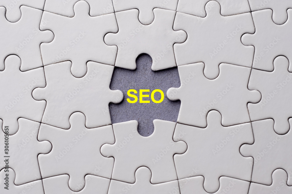 SEO written on blank space of last puzzle piece place SEO written on blank space of last puzzle piece place