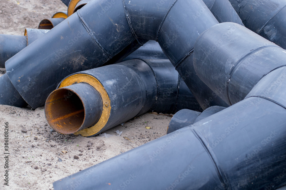 Water pipes lie on the sand. Construction site. Installation of heat pipe pipes. Provision of heat supply. Gas conflict. Construction of a new gas pipeline. Gas Wars. Ukraine. Russia. Gas monopoly. Water pipes lie on the sand. Construction site. Installation of heat pipe pipes. Provision of heat supply. Gas conflict. Construction of a new gas pipeline. Gas Wars. Ukraine. Russia. Gas monopoly.
