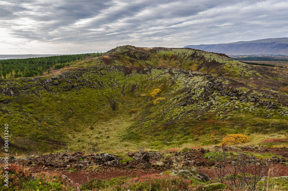typical icelandic landscape near Kerid Crater Lake, formed from an inactive volcano, can be found off the Golden Circle Iceland typical icelandic landscape near Kerid Crater Lake, formed from an inactive volcano, can be found off the Golden Circle Iceland