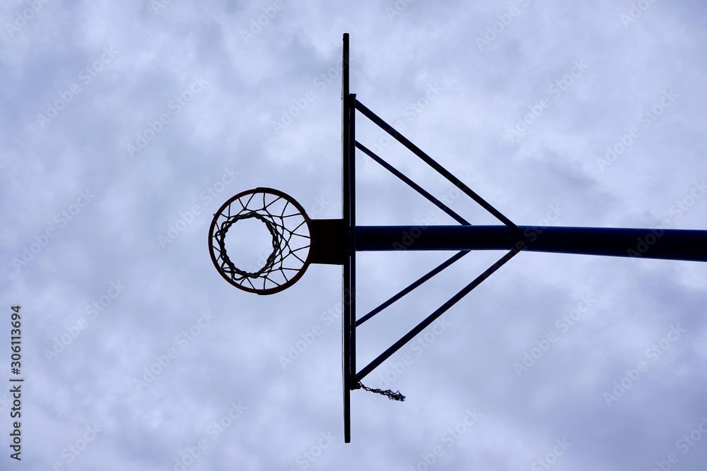 basketball hoop silhouette on the street in Bilbao city Spain basketball hoop silhouette on the street in Bilbao city Spain