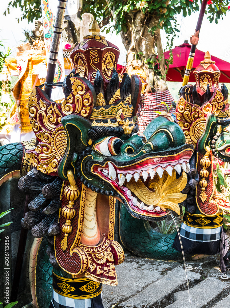 Traditional dragon water fountains in Bali