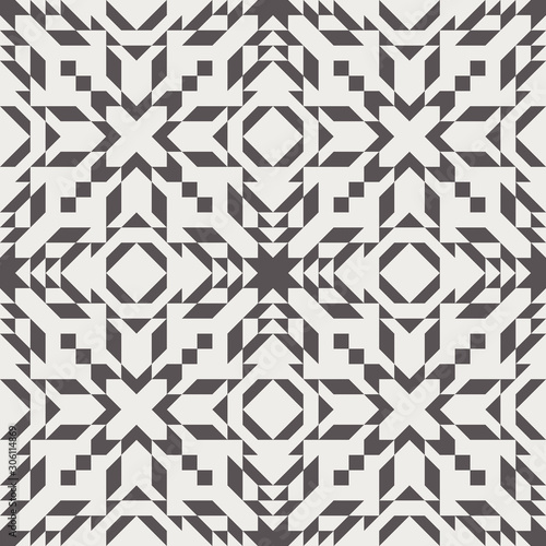 Seamless kilim repeat vector pattern swatch. Aztec, ethnic, african, tribal, or navajo design. Triangles, rhombuses, and other shapes cut from a grid. Chic contemporary geometric motif.