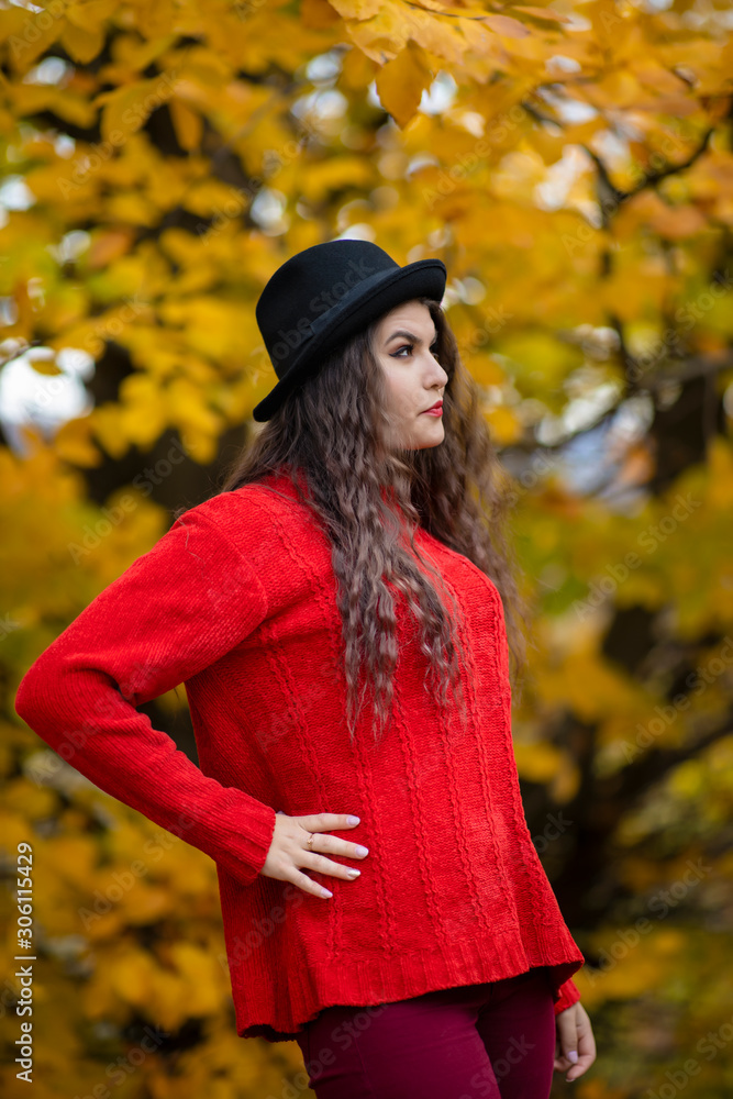 Portrait of a beautiful hispanic young woman in an autumnal forest Portrait of a beautiful hispanic young woman in an autumnal forest