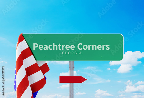 Peachtree Corners – Georgia. Road or Town Sign. Flag of the united states. Blue Sky. Red arrow shows the direction in the city. 3d rendering photo