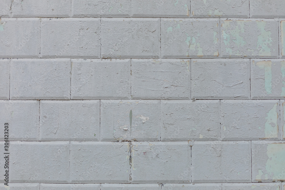 Wall of blue tiles covered with gray paint. Background. Photowall-paper. Copy space. Wall of blue tiles covered with gray paint. Background. Photowall-paper. Copy space.