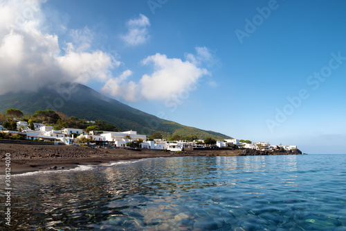 Fototapeta Naklejka Na Ścianę i Meble -   black sand and clear water of the 
