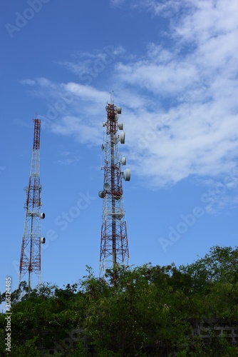 Microwave system.Wireless Communication Antenna With bright sky.Telecommunication tower with antennas.	