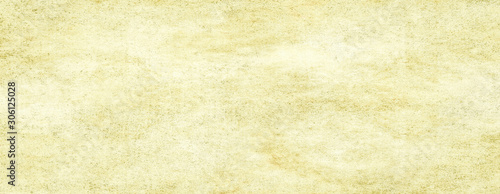 Old yellow light paper background.Light colored vintage paper background for design,web page with copy spice.Long panoramic format.
