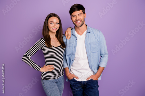 Photo of two people couple guy lady standing close best teammates self-confident mood reliable workers wear casual outfit isolated pastel purple color background