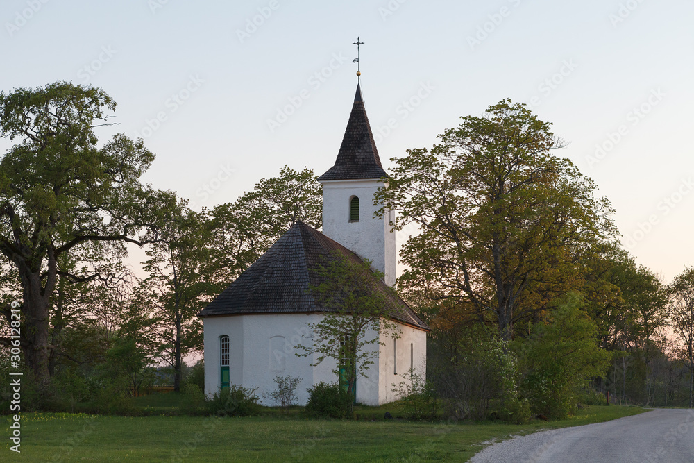 White Christian church in countryside. Estonia.