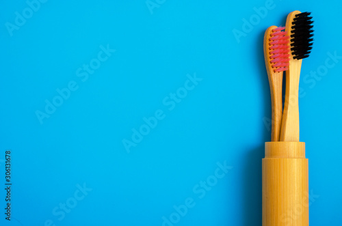 eco natural bamboo toothbrushes on blue background. zero waste flat lay 13