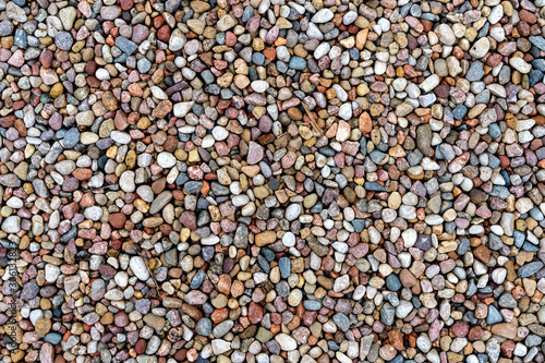 assorted colorful and smooth pebbles from the beach
