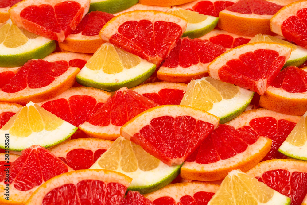 Pomelo and grapefruit slices background. Pomelo and grapefruit slices background.