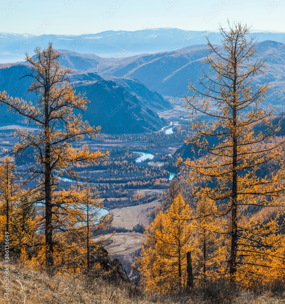 Autumn view, sunny day.  Over the mountain valley. Nature of Siberia, wild place. 