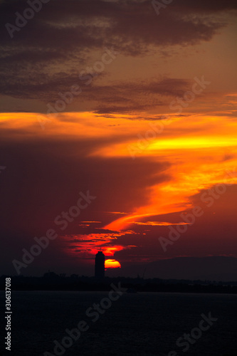 a vibrant blue and golden sunset in the swirling clouds of the izmir-Turkiye