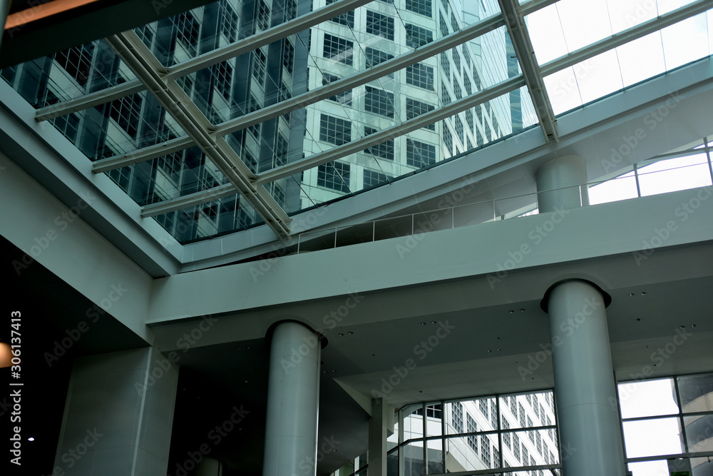 Image of building and condo building at blue sky background.