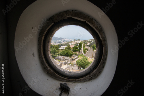 Views of an ancient city from a round window