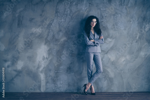 Full length body size view of her she nice attractive lovely charming classy chic content wavy-haired girl hr executive director company leader folded arms gray concrete wall background