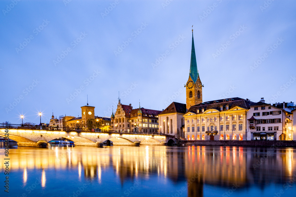 scenic view of historic Zurich city center with famous Fraumunster and Grossmunster Churches and river Limmat at Lake Zurich, Canton of Zurich, Switzerland