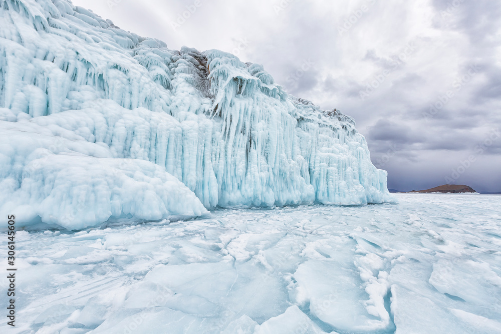 Rocks covered with ice on Lake Baikal in winter Rocks covered with ice on Lake Baikal in winter