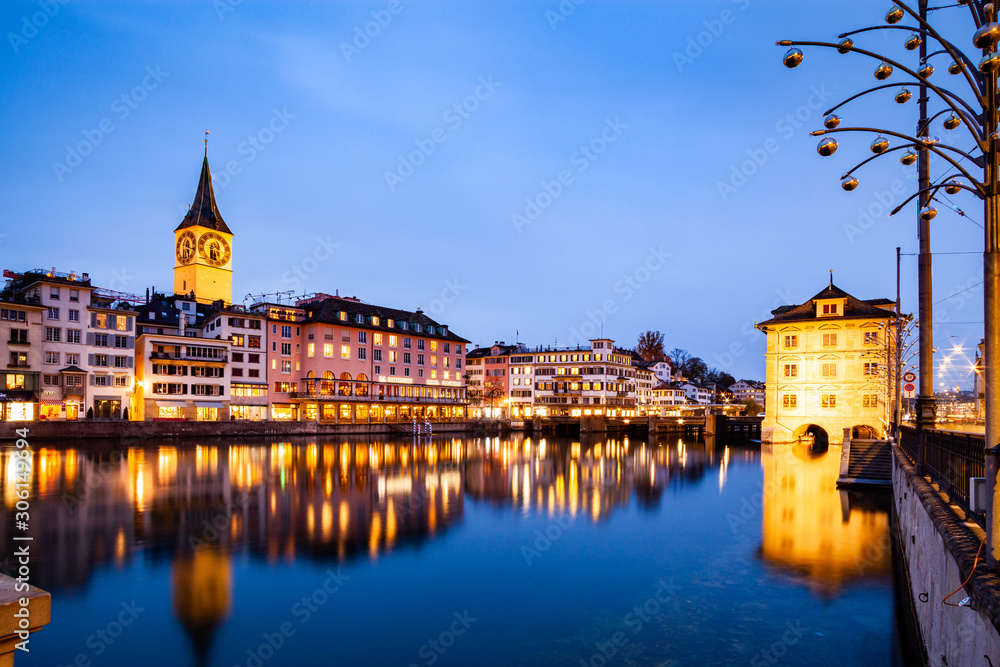 Fototapeta premium scenic view of historic Zurich city center with famous Fraumunster and Grossmunster Churches and river Limmat at Lake Zurich, Canton of Zurich, Switzerland