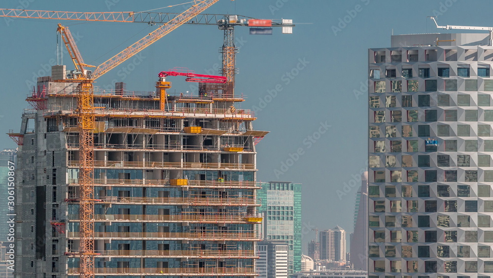 Construction of new modern skyscrapers in luxury Dubai city,United Arab Emirates