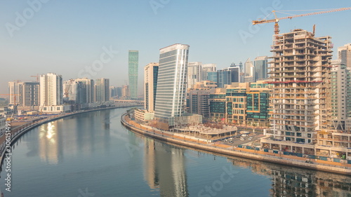 The rhythm of the city of Dubai from night to day transition aerial timelapse