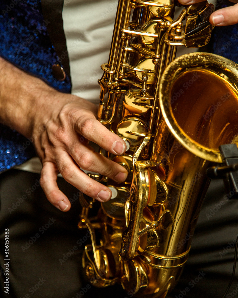 Fototapeta premium man playing on saxophone