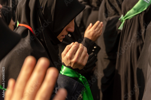 Ashura (asura or asure) ceremony in istanbul. Turkish Shiite woman mourn and pray for Husayn who killed in Battle of Karbala. 