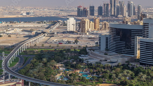 View of new modern buildings and high traffic in luxury Dubai city, United Arab Emirates Timelapse Aerial