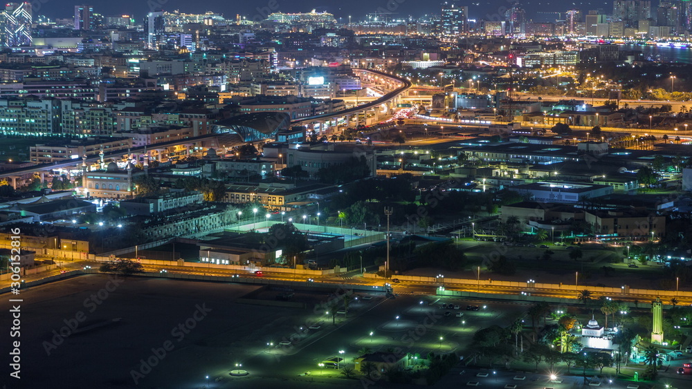 Fototapeta premium Night rhythm of the city of Dubai aerial timelapse