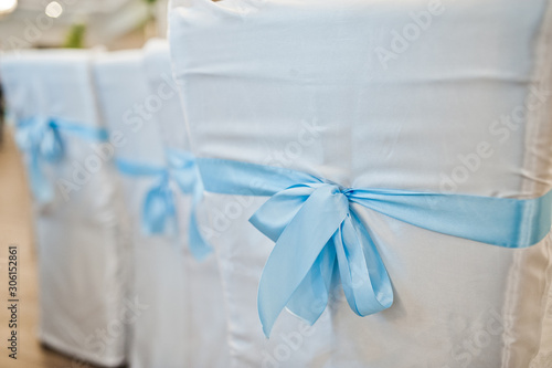 Wallpaper Mural Beautiful wedding set decoration in the restaurant. Blue ribbons on chairs. Torontodigital.ca