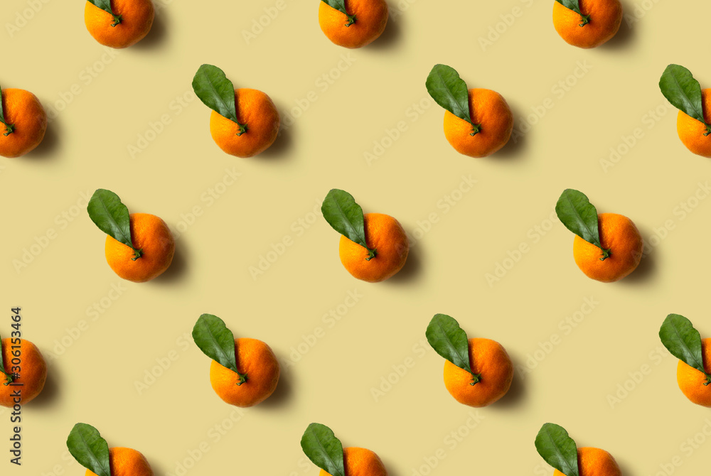 Naklejka Mandarin pattern isolated on green background. Fresh fruit.