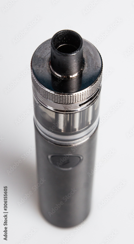 Isolated electronic cigarette chunky vape life vapour nicotine quit smoking black red glass metal used power unhealthy lung problems Isolated electronic cigarette chunky vape life vapour nicotine quit smoking black red glass metal used power unhealthy lung problems
