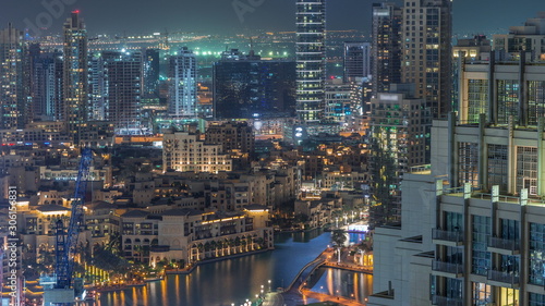 Amazing aerial view of Dubai downtown skyscrapers night timelapse, Dubai, United Arab Emirates © neiezhmakov