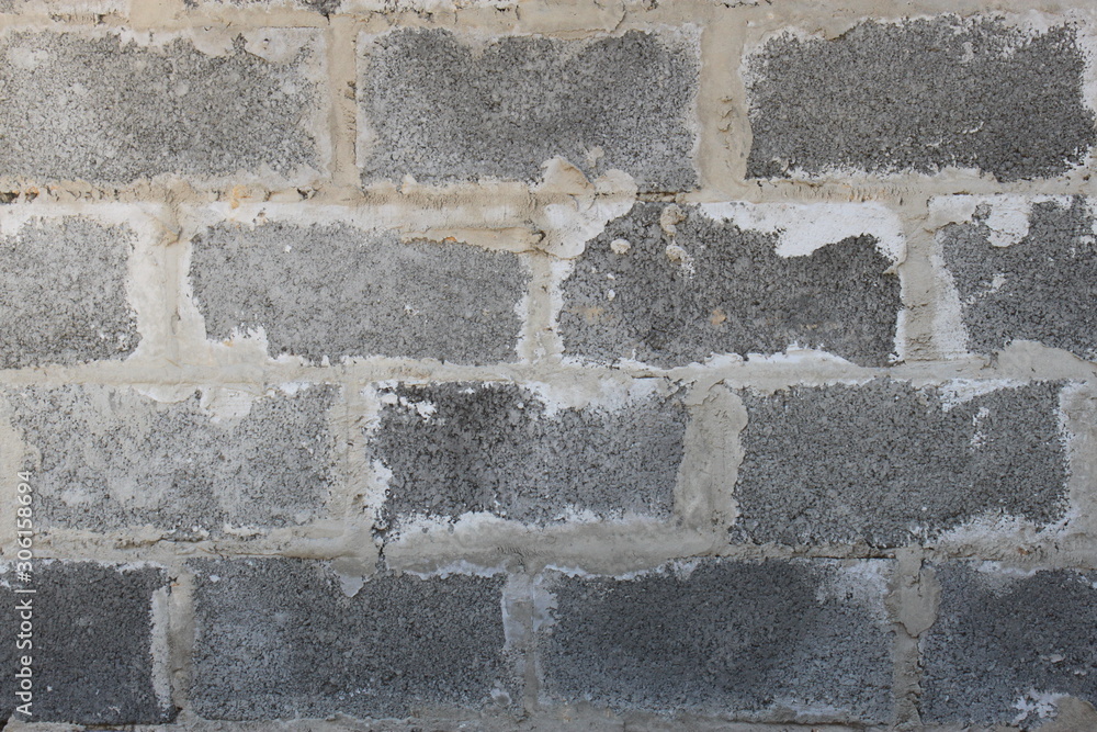 Obraz premium Wall built from large kerpich close-up