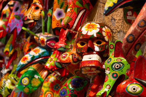 Bild auf Leinwand Colorful hand-painted skull with flowers - colorful crafts - Antigua Guatemala