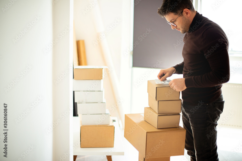 Delivery service, applying a shipping label Delivery service, applying a shipping label