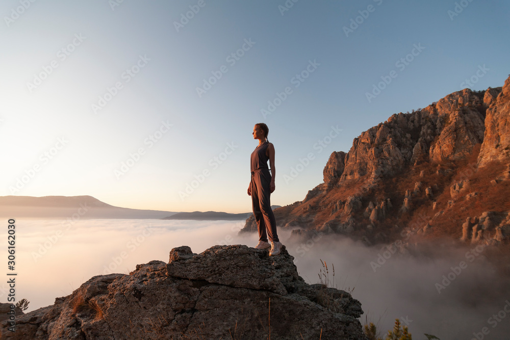 girl walks in the mountains