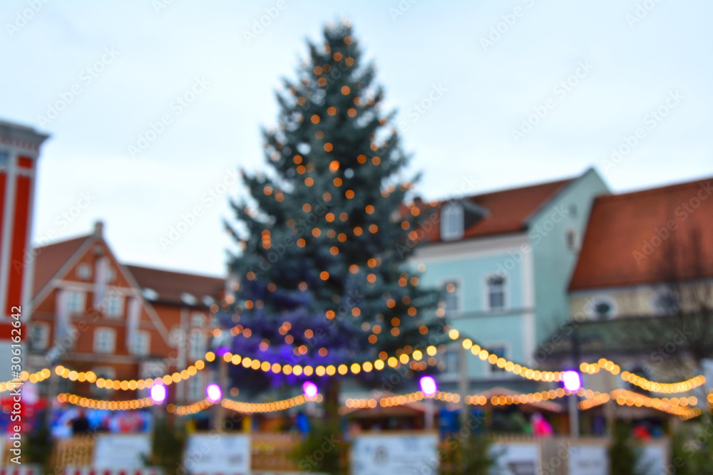 Blurred Christmas market in little town in Germany.