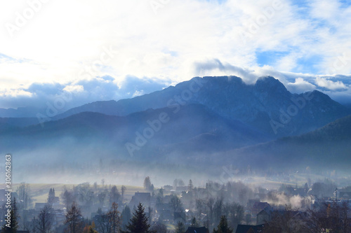 Morning autumn misty landscape view of Zakopane and Tatra mountains.